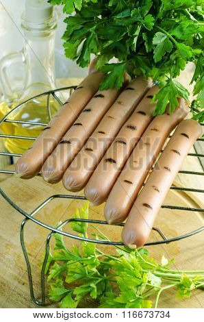 sausages on the grill
