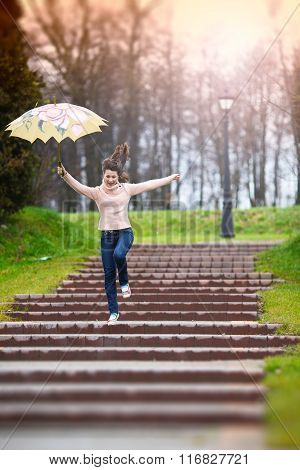 Happy Girl With Unbrella