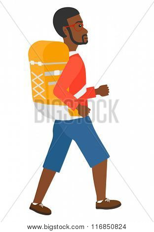 Man with backpack hiking.