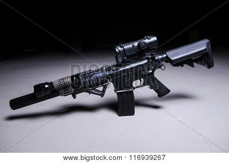 Automatic Rifle With Silencer And Optical Scope.