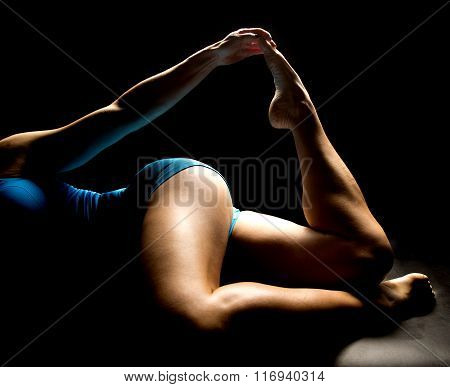 Woman In Blue Shorts Lay Legs Forward Toe Up Highlighted