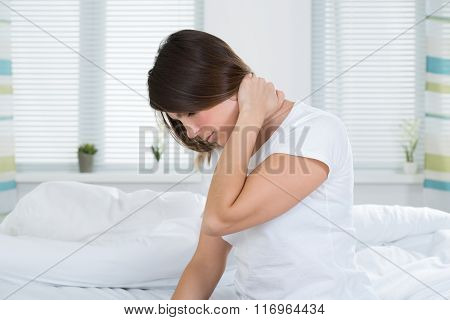 Woman Suffering From Neck Pain