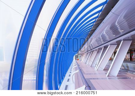 Glass futuristic corridor inside the Bridge Bagration of Moscow City Russia.