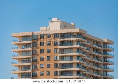 Multi-level building close up. Urban background scene