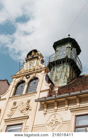 Graz, Austria - August 11, 2017: Low angle view of Glockenspiel against sky in historical city center of Graz