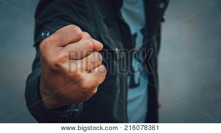 A man was fists clenched in anger
