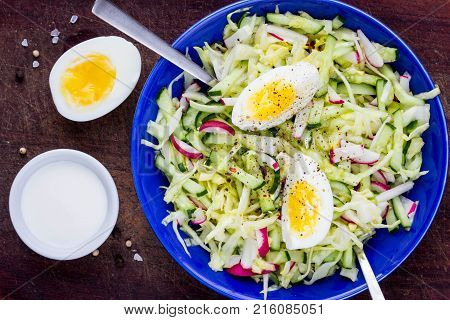 Fresh Salad With Cabbage, Cucumber, Radish And Egg, Healthy Spring Dish In Rustic Style And Bright P