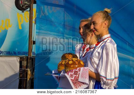 Unknown People Enjoy On The Beach Of Azov Sea