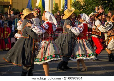 Unknown People Enjoy On The Beach Of Azov Sea
