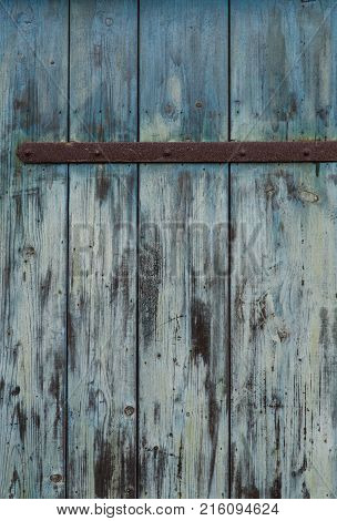 Turquoise wooden door retro vintage background structure.