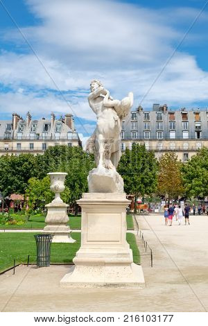 PARIS,FRANCE - JULY 29,2017 : Parisians enjoying summer at the Tuileries Garden in Paris