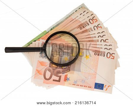 Background with euro money. Magnifier focused on keys. Euro banknotes. 50 euro.