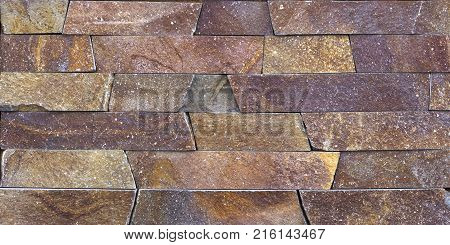 Stone wall texture, travertine tiles facing background