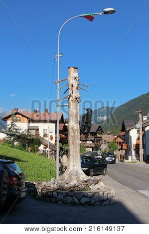 Italy Rocca Pietore - August 26 2016: the view of the decorative ironwork sculpture butterflies on a wall on August 26 2016 Veneto Italy.