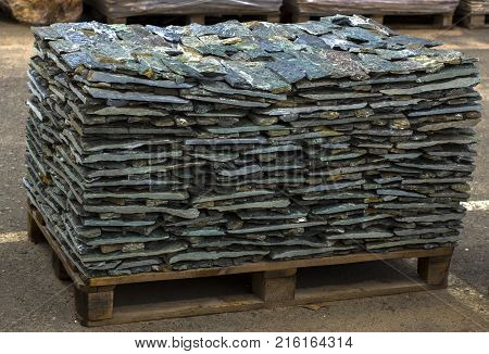decorative building stone on a pallet can be used for advertising.