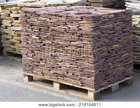 decorative building stone on a pallet can be used for advertising.