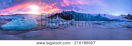 Beautiful iceberg lagoon in fjallsarlon with frozen floes, winter panoramic landscape in high resolution. Global warming and melting ice concept