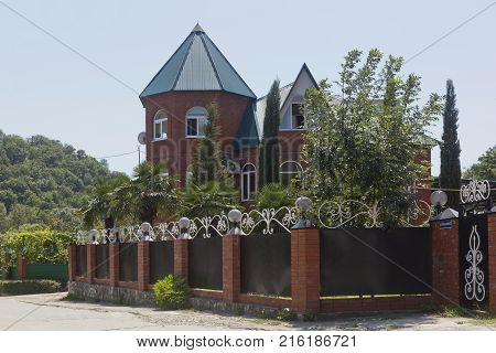 Dederkoy, Tuapse District, Krasnodar Region, Russia - July 7, 2013: Beautiful red brick house