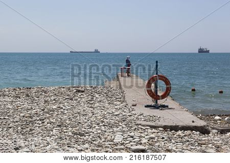 Dederkoy, Tuapse District, Krasnodar Region, Russia - July 7, 2013: Lifebuoy on a beach in Dederkoe