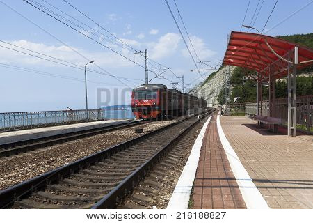 Dederkoy, Tuapse District, Krasnodar Region, Russia - July 9, 2013: The approaching train Tuapse - Adler