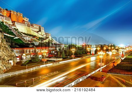 Potala Palace in Lhasa the former residence of the Dalai Lama Tibet China Asia night horizontal city view.