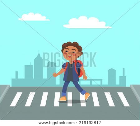 Smiling boy at crosswalk on urban city background. Schoolboy with backpack on pedestrian hurry to school. Right way to pass the street