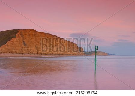 Sunset in West Bay Dorset England. The area is part of the Jurassic Coast a World Heritage Site.