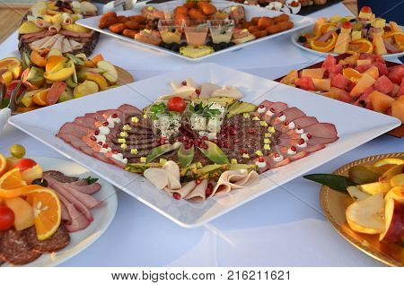 A plate filled with hole difrents meat