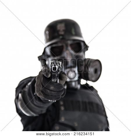 Futuristic nazi soldier gas mask and steel helmet with luger pistol handgun isolated on white studio shot