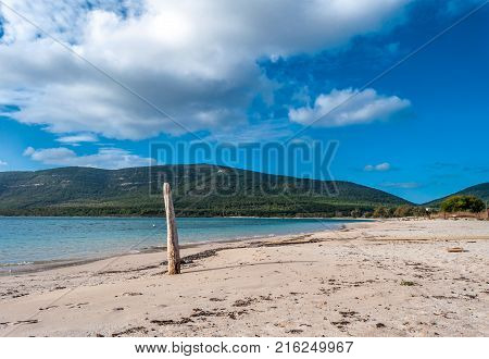 Beach In A Sunny And Cloudy Day