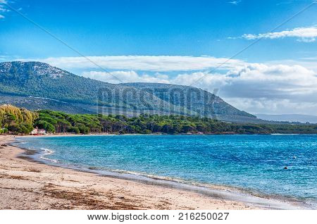 Beach In A Sunny And Cloudy Day