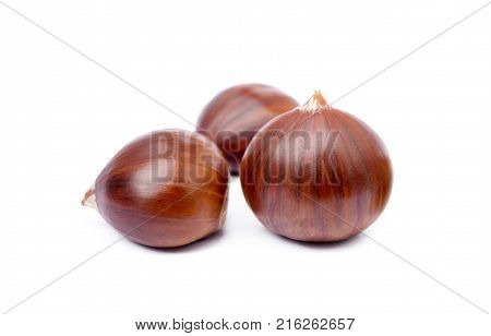 Fresh ripe chestnuts isolated on white background