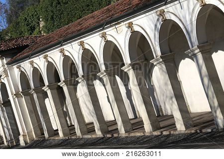Arcades And City Of Vicenza Italy  In Background