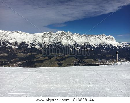 Beautiful mountain range (Kaiser Mountains) and ski run at Wilder Kaiser region in Tyrol, Austria