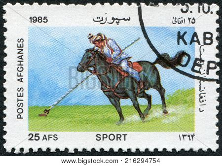 AFGHANISTAN - CIRCA 1985: A stamp printed in the Afghanistan shows Buzkashi, circa 1985