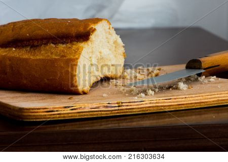 piece of the bread and its crumbles