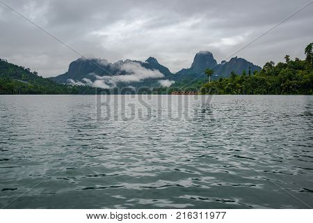 Dam view to the mountain with floating house for traveling