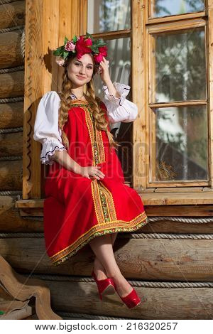 Russia, Moscow, Izmaylovsky Park, August 27, 2017. International Photo Festival.Beautiful woman portrait in russian style. Beautiful Russian girl in traditional dress. Russian style.