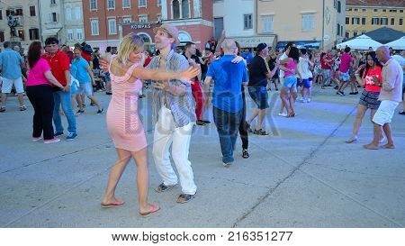 ROVINJ, ISTRIA, CROATIA - JUNE 26, 2017: Salsa Dancing in the town square Rovinj Croatia
