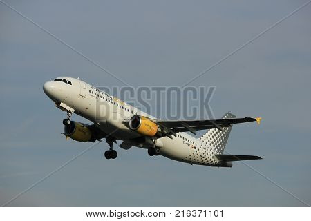 Amsterdam the Netherlands - June 2nd 2017: EC-MBY Vueling Airbus A320 taking off from Polderbaan Runway Amsterdam Airport Schiphol