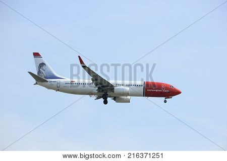 Amsterdam the Netherlands - March 31st 2017: LN-NGN Norwegian Air Shuttle Boeing 737 approaching Polderbaan runway at Schiphol Amsterdam Airport the Netherlands