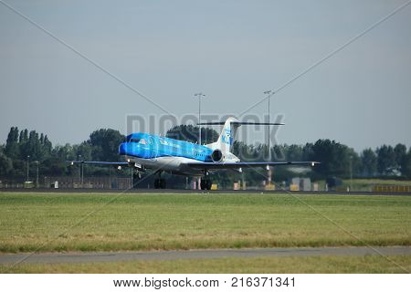 Amsterdam the Netherlands - August 18th 2016: PH-KZU KLM Cityhopper Fokker F70 taking off from Polderbaan Runway Amsterdam Airport Schiphol