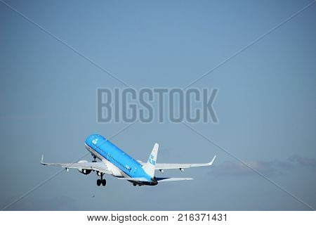 Amsterdam the Netherlands - August 18th 2016: PH-EZU KLM Cityhopper Embraer ERJ-190STD taking off from Polderbaan Runway Amsterdam Airport Schiphol