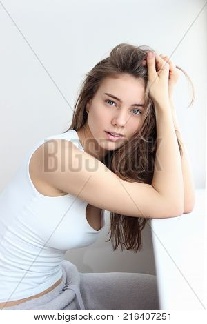 portrait of a girl in high key on white background