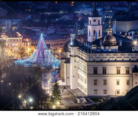 Vilnius, Lithuania: Christmas tree and decorations in Cathedral Square, aerial top view