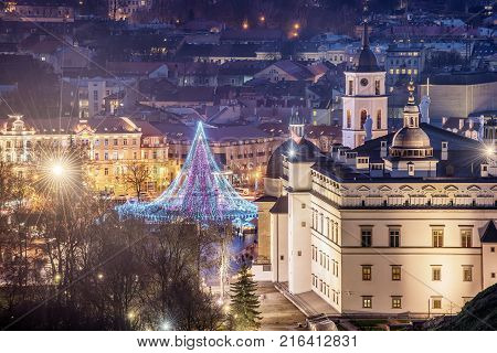 Vilnius, Lithuania: Christmas tree and decorations in Cathedral Square, aerial top view