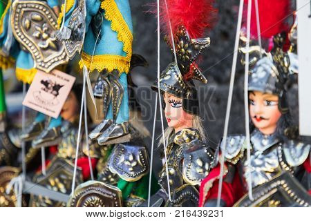 Some Sicilian puppets with their typical brassy armor and painted face