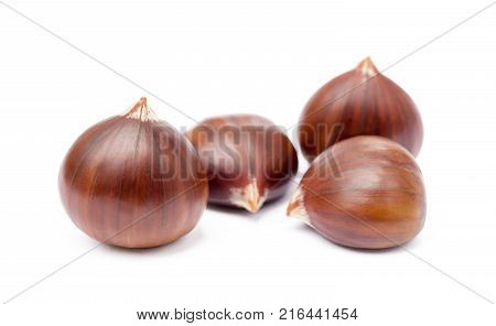 Fresh ripe chestnuts isolated on white background
