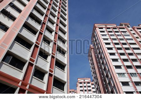 Block of HDB Flats found in Singapore against blue sky