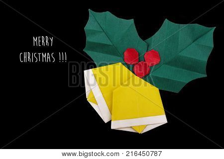 Merry Christmas text with origami bells on a black background